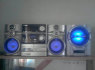 sudrebink zeme su SHARP muzikiniu centru